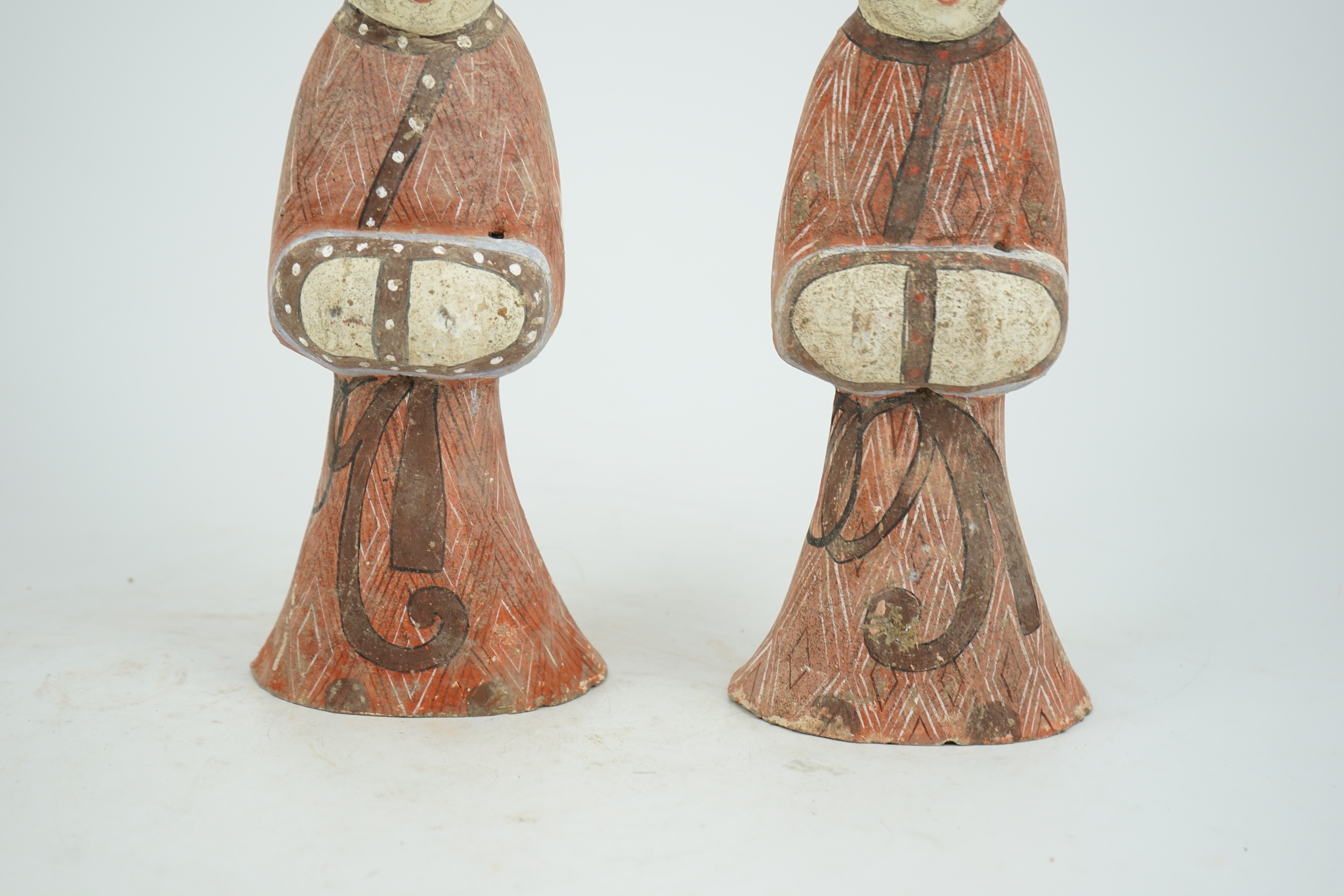 A pair of Chinese Han style painted pottery ladies, 29.5cm